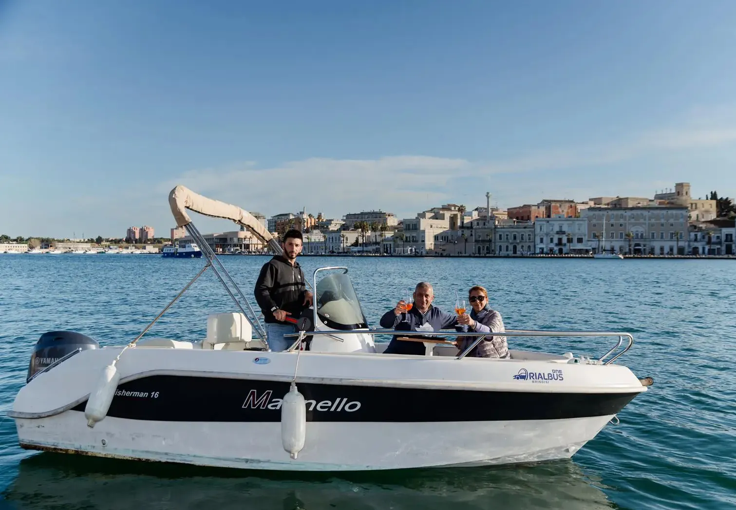 Boat trip to Brindisi with aperitif, boat with city in the background