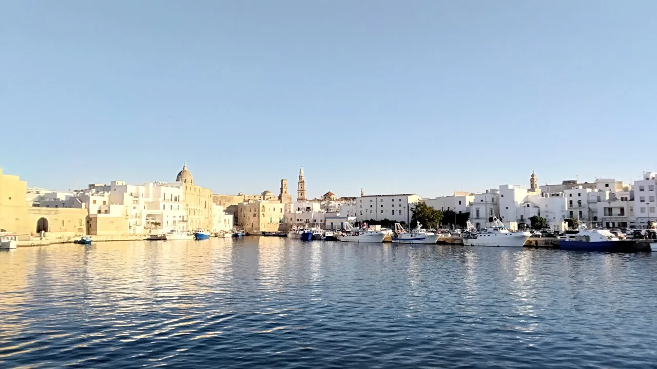 Monopoli's historic center, view from the sea of Charles V's Castle and the Old Port.