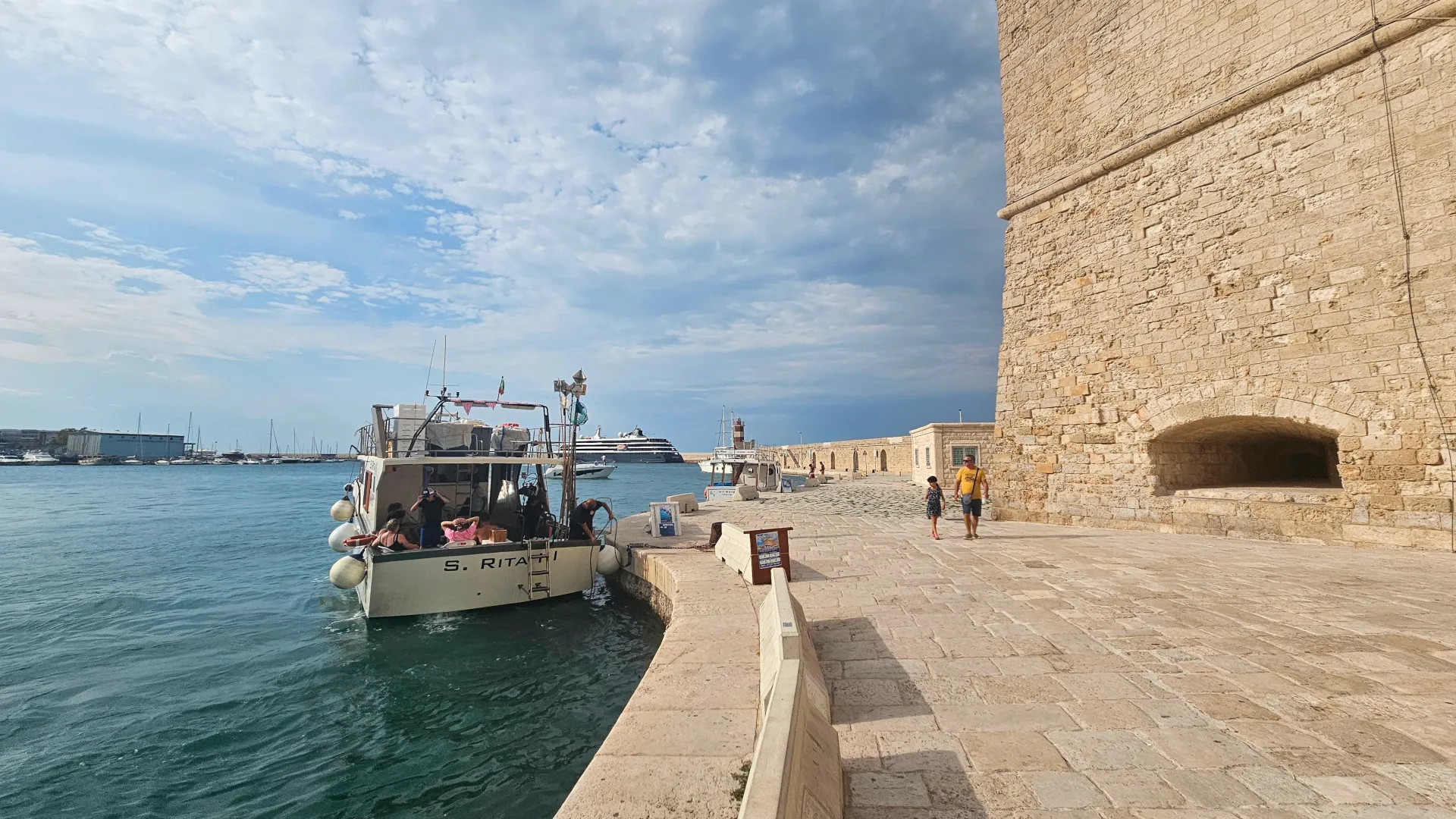 Boat trip departing from the new port, in the historic center of Monopoli