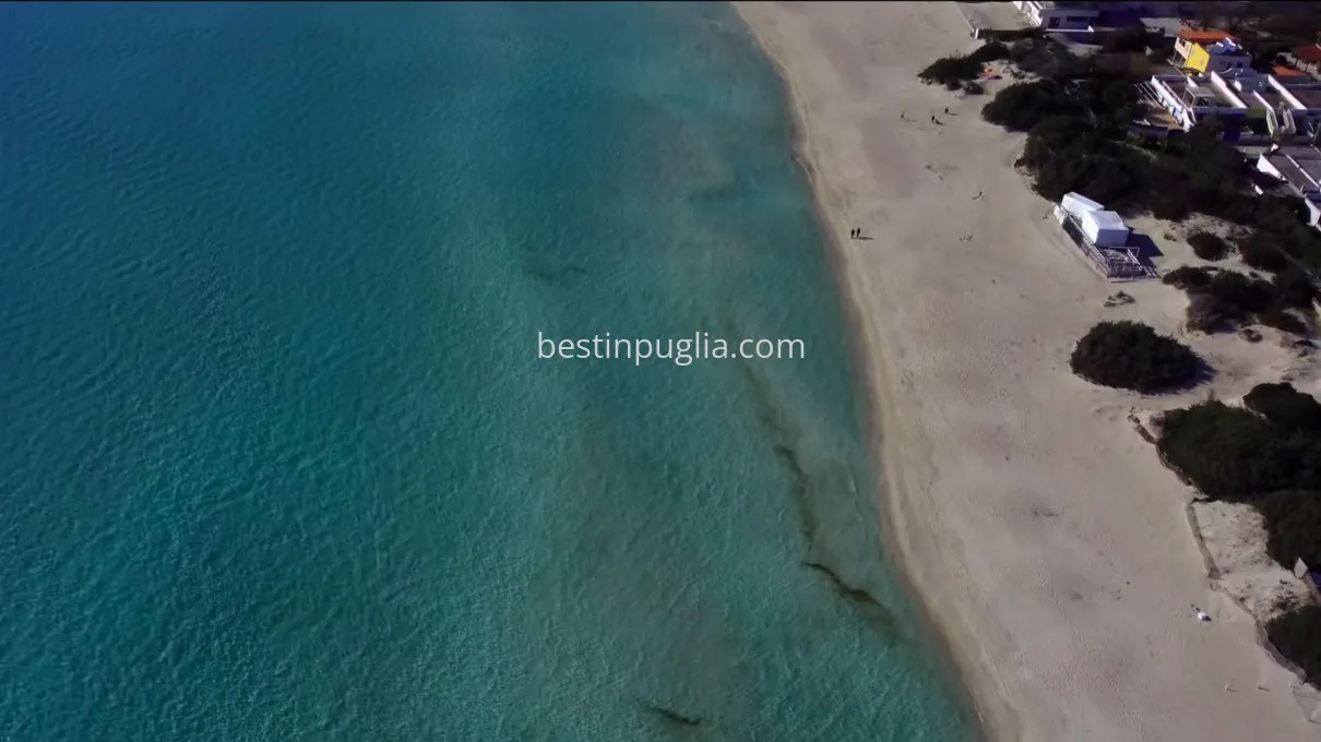Torre Lapillo, the white sand beach and crystal clear water